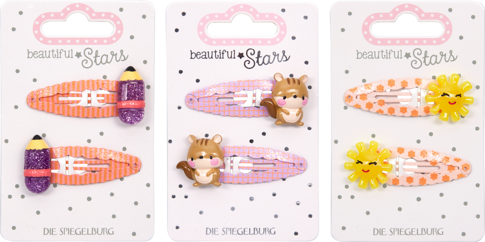 Drei Karten mit je zwei Haarspangen, dekoriert mit Bleistift-, Eichhörnchen- und Sonnenmotiven.