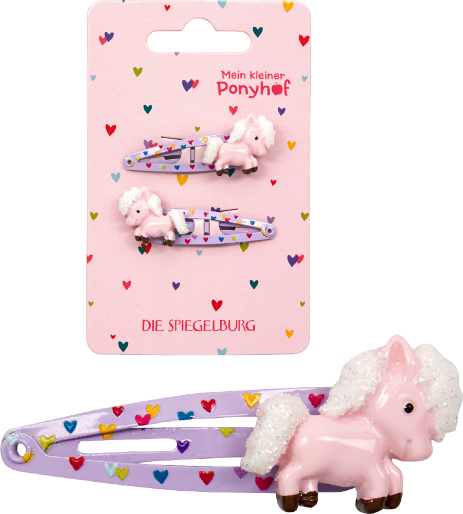 Zwei lila Haarspangen mit rosa Pony-Dekoren auf Karte mit Herzmuster.
