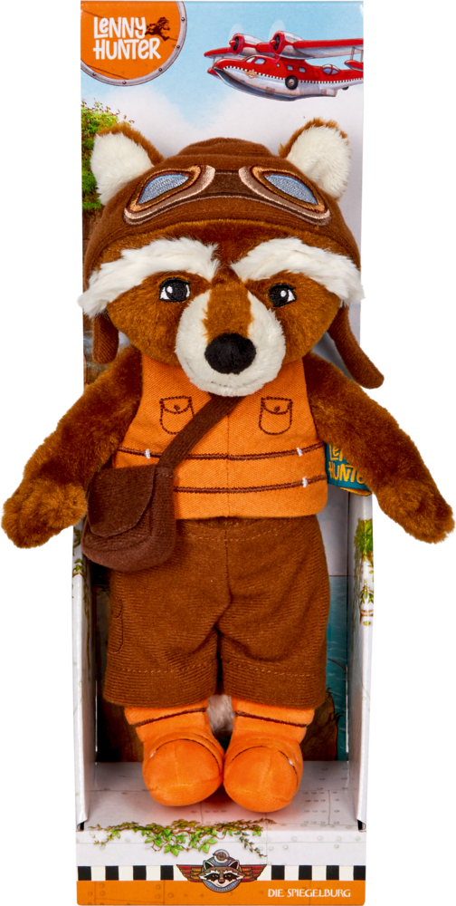 Plüschiger brauner Waschbär mit Pilotenbrille, orangefarbener Weste und brauner Hose, steht in einer Pappbox.
