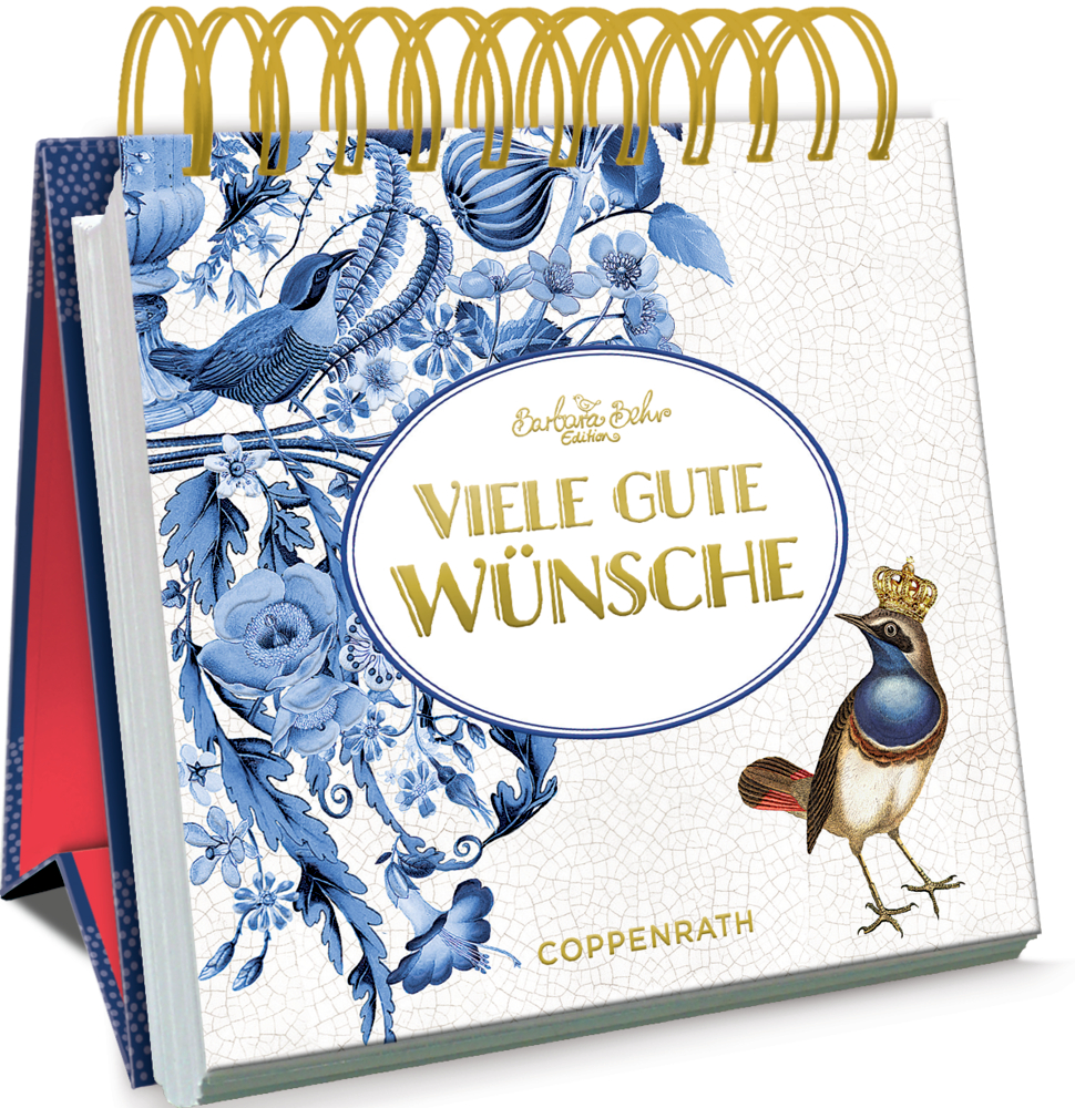 Spiralaufsteller mit blauem Blumenmuster, Vögeln und „Viele gute Wünsche“ auf dem Einband.