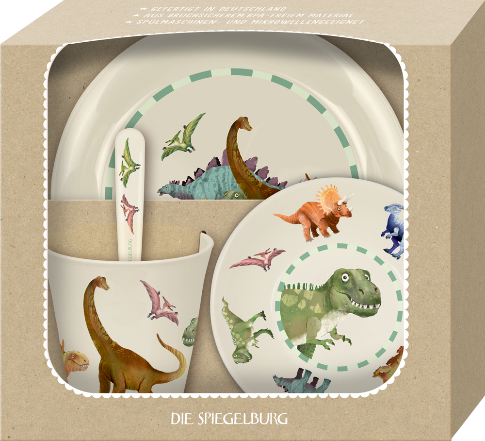 Geschirrset für Kinder mit Dinosauriermotiven: Teller, Schüssel, Tasse, Gabel und Löffel in einem Karton mit Sichtfenster.