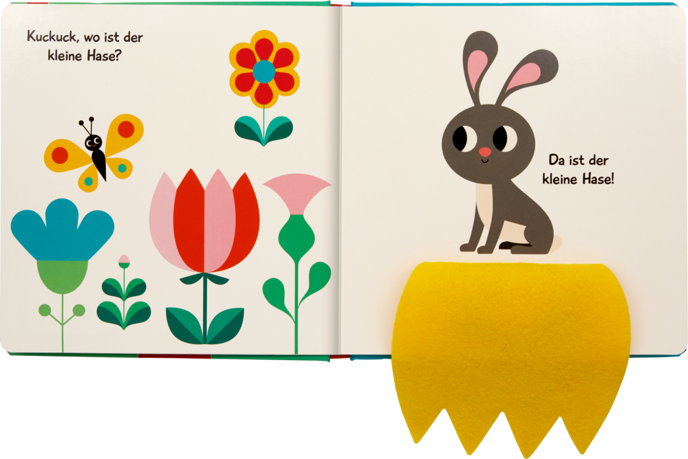 Buntes Kinderbuch mit Blumen, einem Schmetterling und einem Comic-Hasen mit gelbem Filz auf der rechten Seite,  Text auf beiden Seiten.