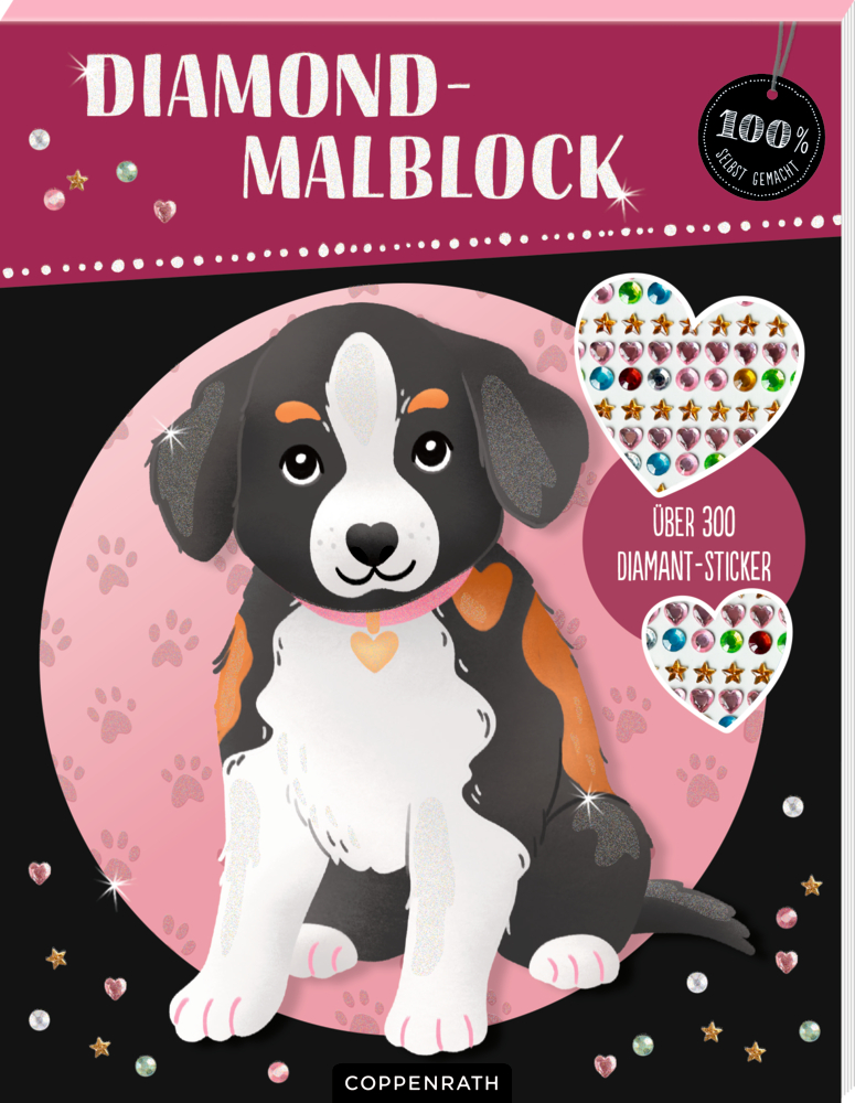 Welpe mit Herzanhänger auf rosa-schwarzem Einband von einem Diamond-Malblock, umgeben von glänzenden Aufklebern und Pfotenabdrücken.