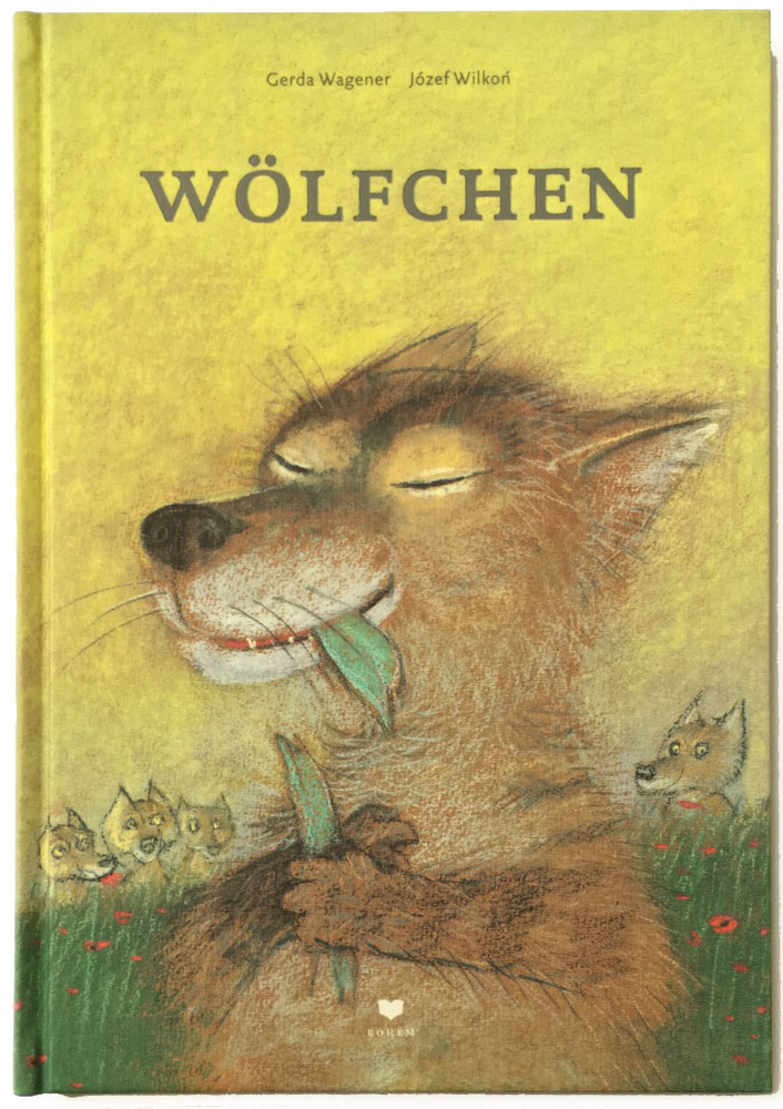 Buchcover: Ein lächelnder Wolf, der ein Blatt hält, mit verspielten Wolfsjungen im Hintergrund.