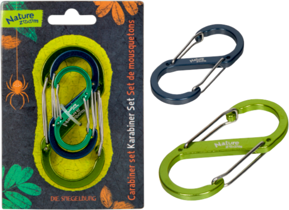 Drei ovale Karabiner (blau, grün, blaugrün) auf einer Nature Zoom-Blisterpackung, zwei weitere sind separat abgebildet.