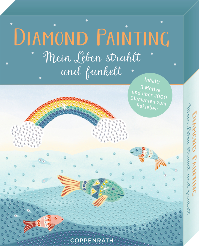 Diamond Painting Kit-Box mit Regenbogen, drei Fischen und dekorativem deutschen Text auf dem Deckel.