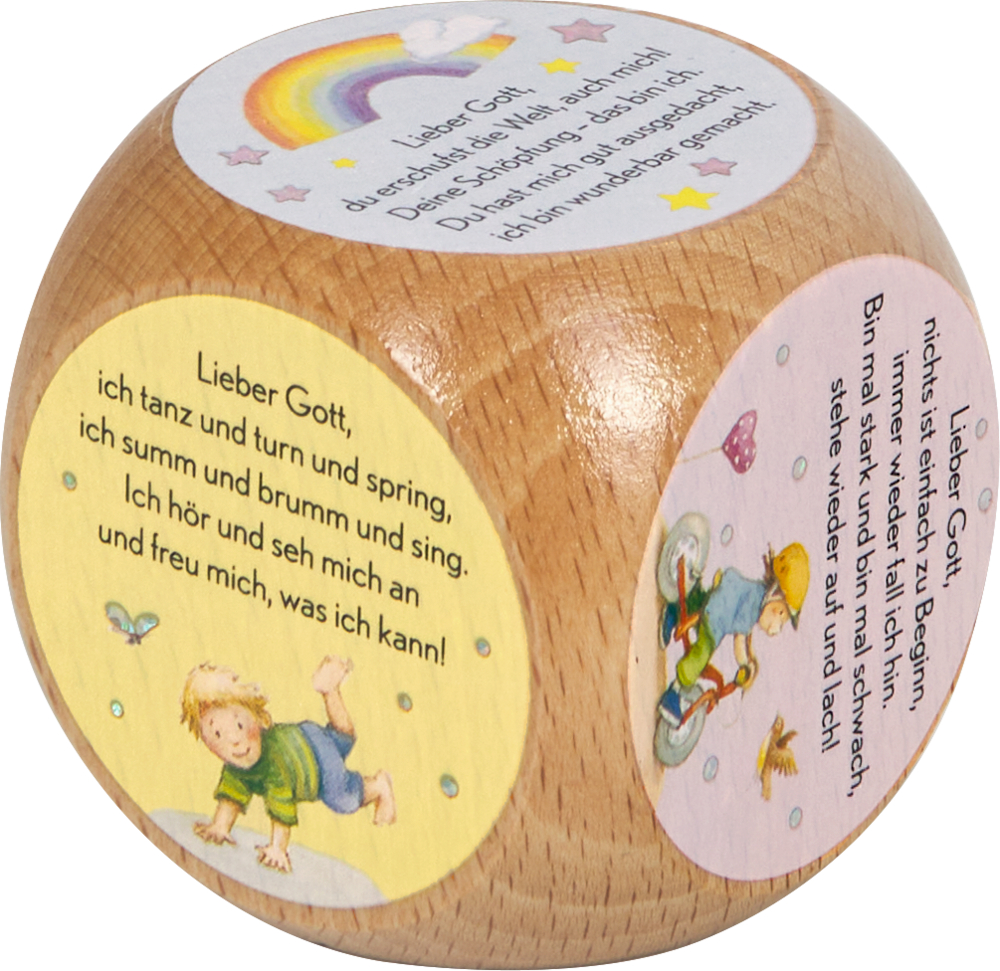 Holzwürfel mit Gebeten, freundlichen Zeichnungen und einem Regenbogen auf den Flächen.