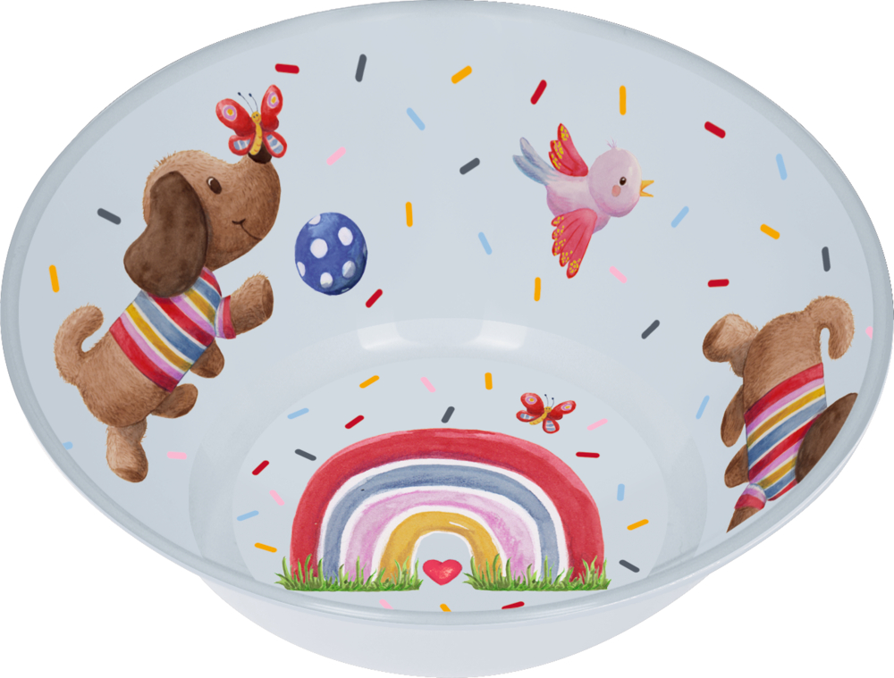Hellblaue Schüssel mit buntem Hunde-, Vogel-, Regenbogen- und Streuselmuster.