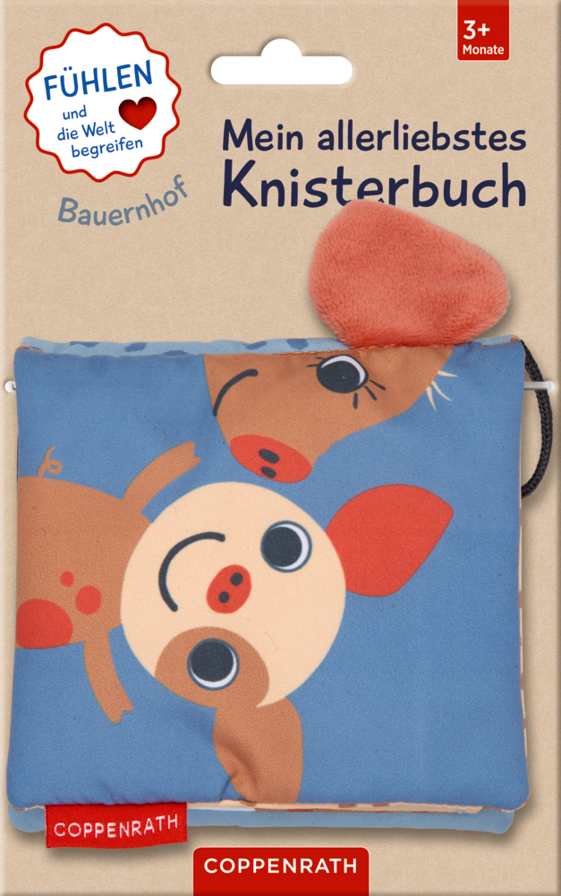 Weiches Babybuch mit Cartoon-Einband mit Schweinen, befestigt an einem Pappetikett.