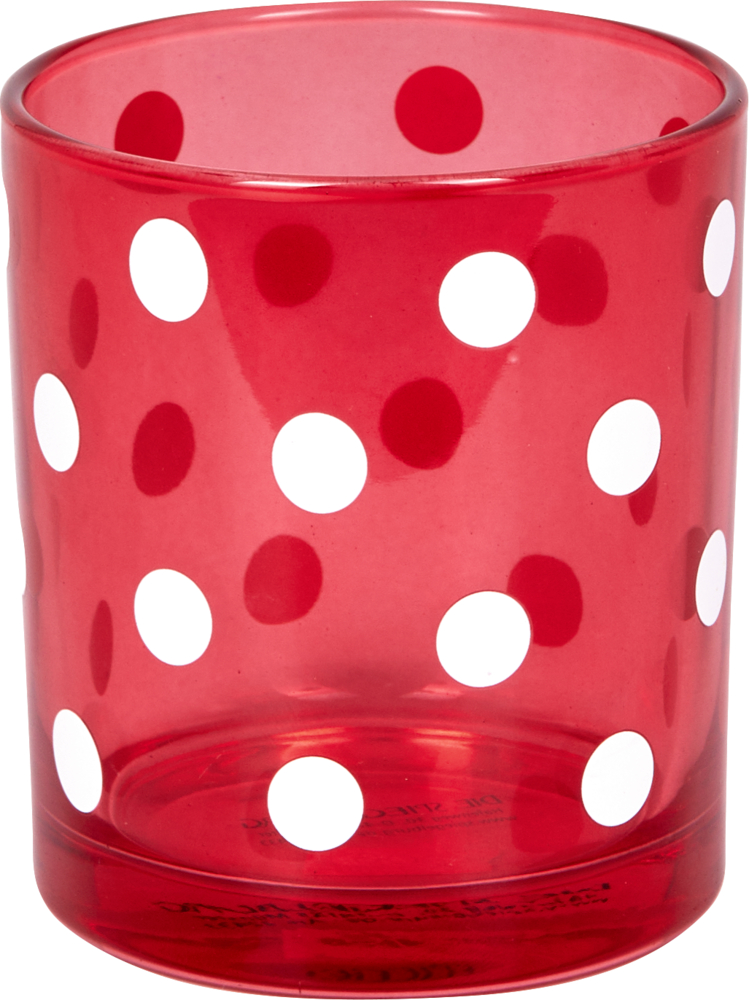 Rotes Glas mit weißen Punkten auf der Oberfläche.