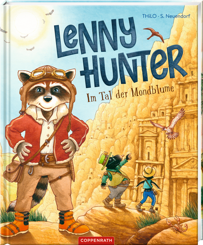 Auf dem Cover von "Lenny Hunter - Im Tal der Mondblume" ist ein Waschbär in Fliegermontur der vor einer antiken Ruinen steht, während seine Freunde die felsige Landschaft erkunden.