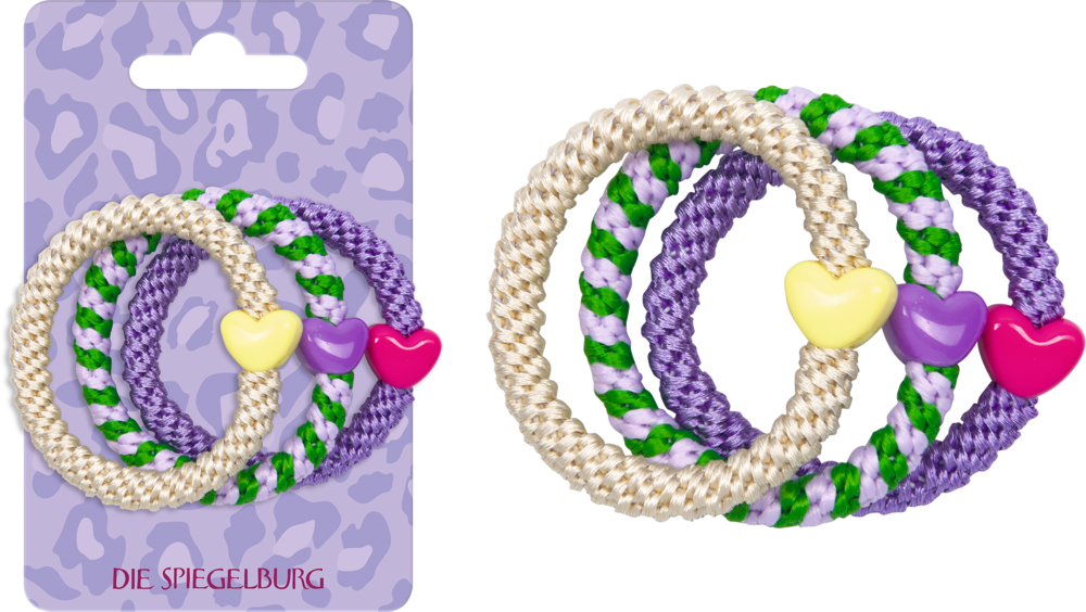 Drei Haargummis in Lila-, Grün- und Beigetönen mit Herzperlen in Gelb, Lila und Pink, daneben diesen Set auf der Produktverpackung.