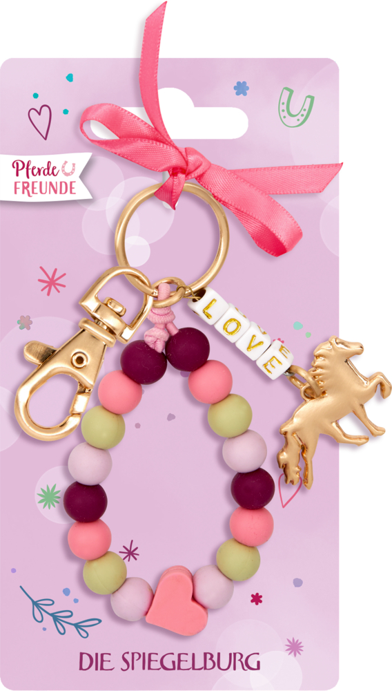 "Schlüsselanhänger mit bunten Perlen, goldenem Pferdeanhänger und goldenem Karabiner auf einer pinken Pappkarte.  "