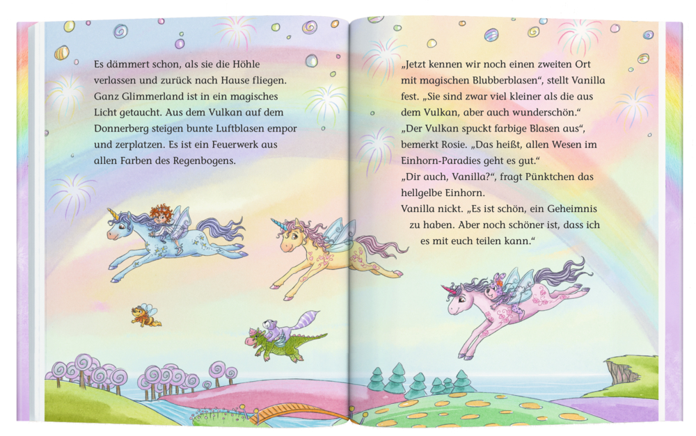 Vier bunte Einhörner fliegen über eine Regenbogenlandschaft mit Glitzer, Blasen und einem Vulkan im Hintergrund, auf einer Innenansicht mit Text.