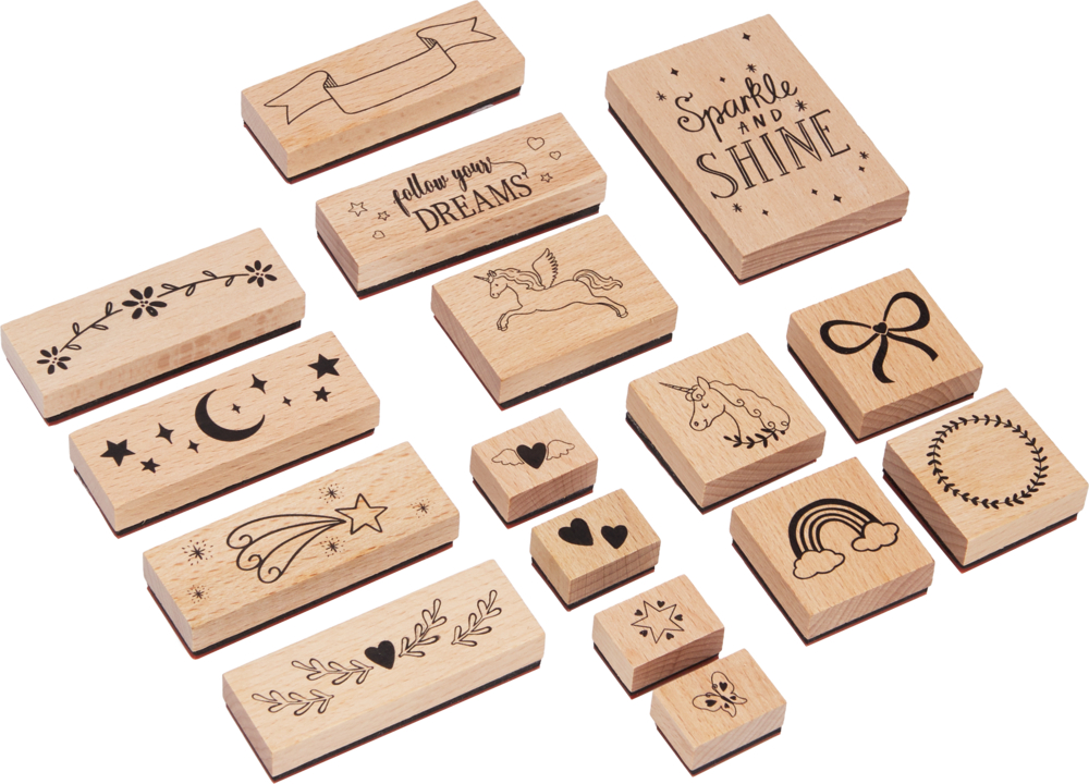 Set aus Holzstempeln mit Motiven wie Einhorn, Herz, Schleife, Regenbogen, Sternschnuppe und Schriftzügen.