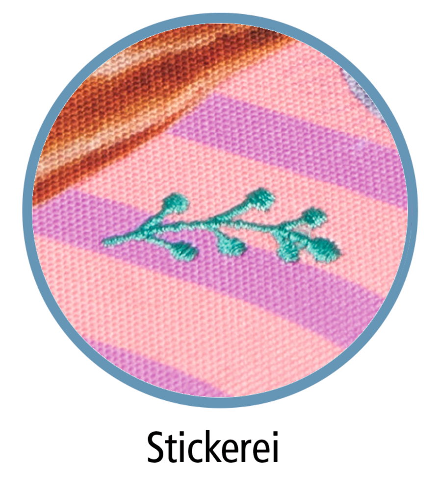 Grüner Zweig mit Blättern als Stickerei auf rosa Stoff mit lilafarbenen Streifen