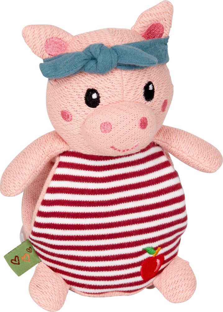 Ein rosa Stoffschwein mit blauem Stirnband und rot gestreiftem Hemd mit einem Apfelaufnäher.