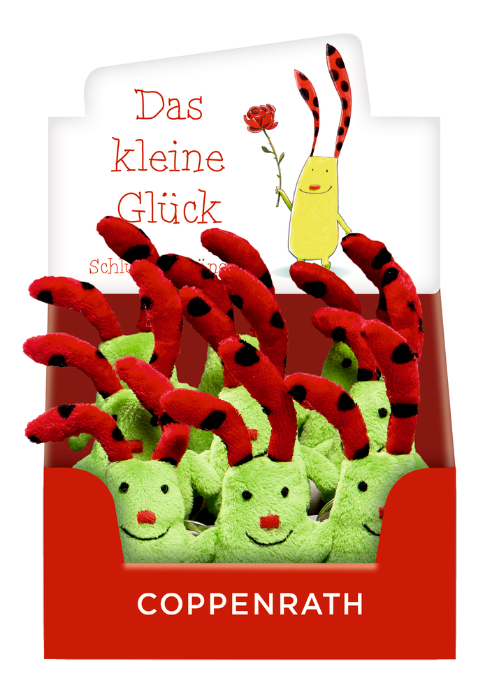 Grüne Plüschtiere mit roten, schwarz gepunkteten Fühlern in einer roten Coppenrath-Box, deutscher Text im Hintergrund.