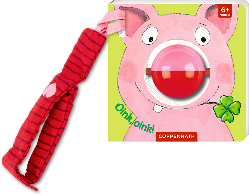 Babybuch mit Cartoon-Schweinegesicht, Kullerkugel als Nase und rot gestreiftem Stoffband.