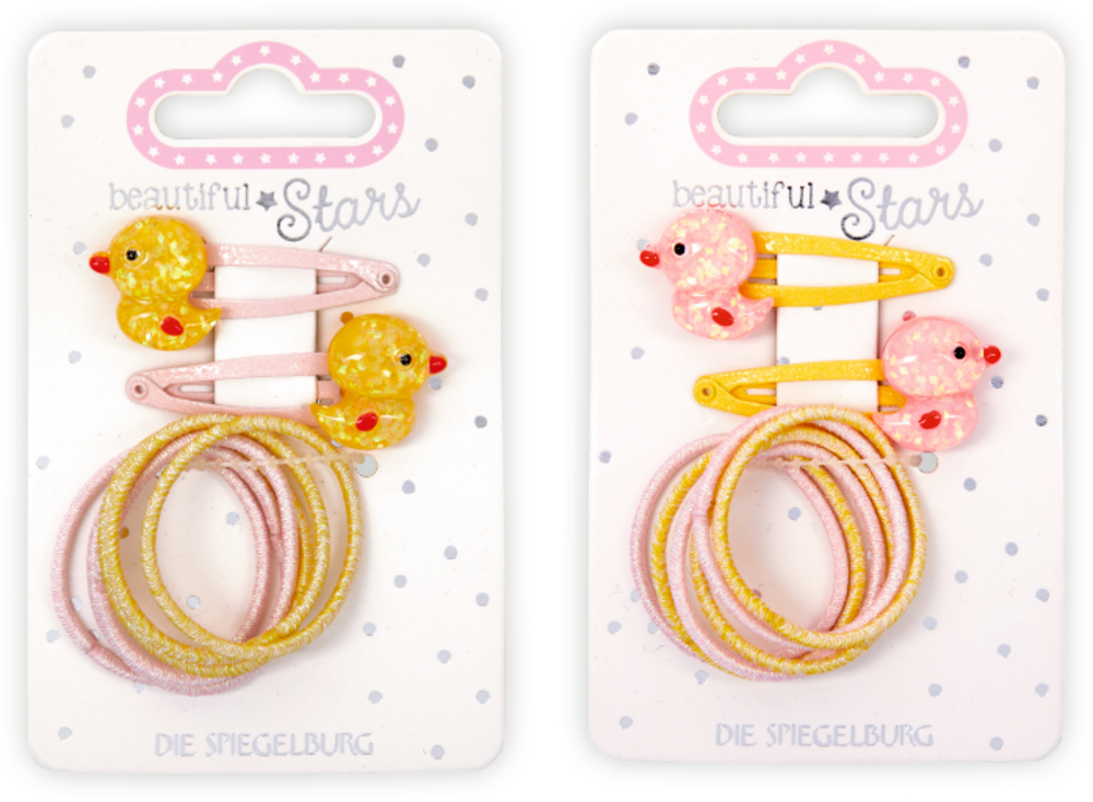 Zwei Sets Haarschmuck: Entenspangen und pastellfarbene Haargummis auf gepunkteten „Beautiful Stars“-Karten.