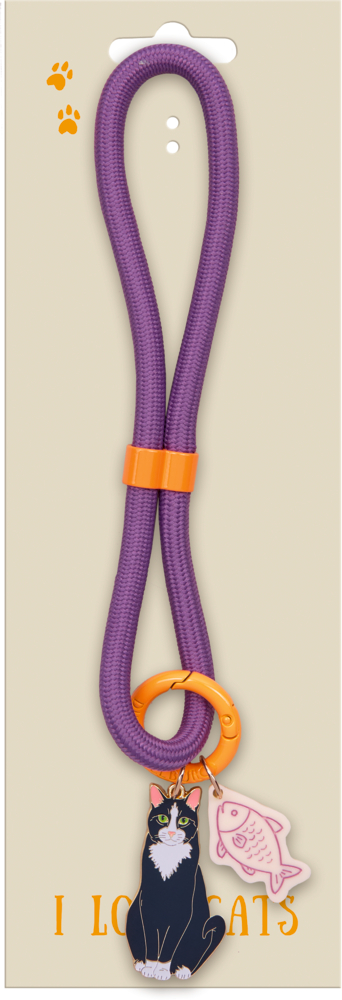 Lila Schlüsselband mit orangefarbenem Karabiner und Anhängern in Form einer schwarzen Katze und eines rosa Fisches auf Pappverpackung.