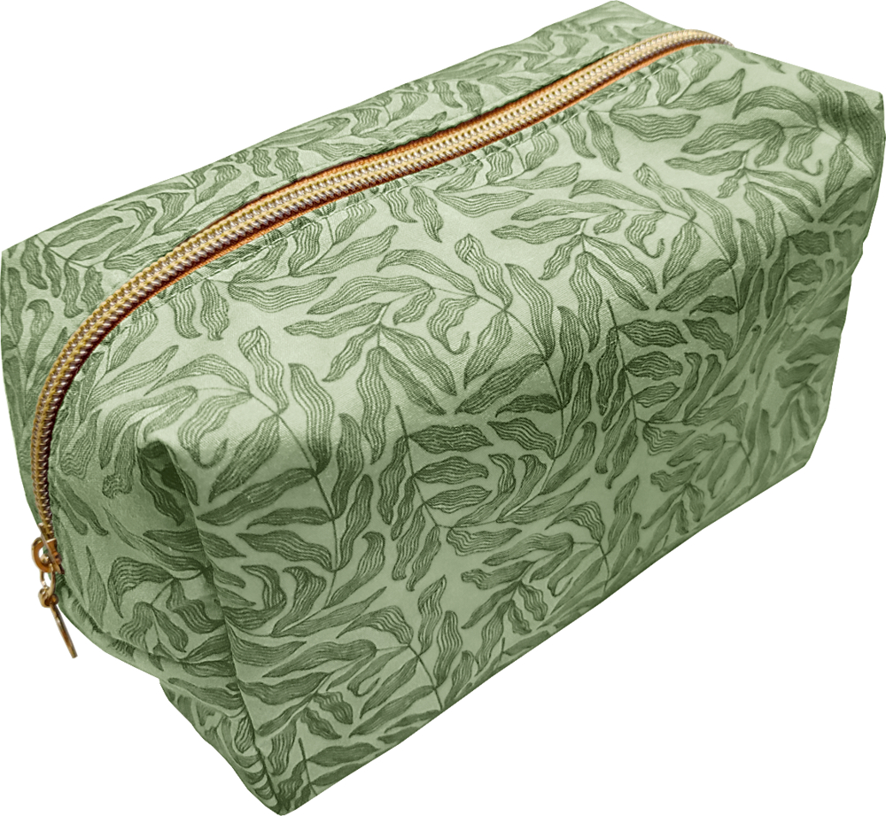 Grünes rechteckiges Etui mit Blattmuster und goldenem Reißverschluss oben.