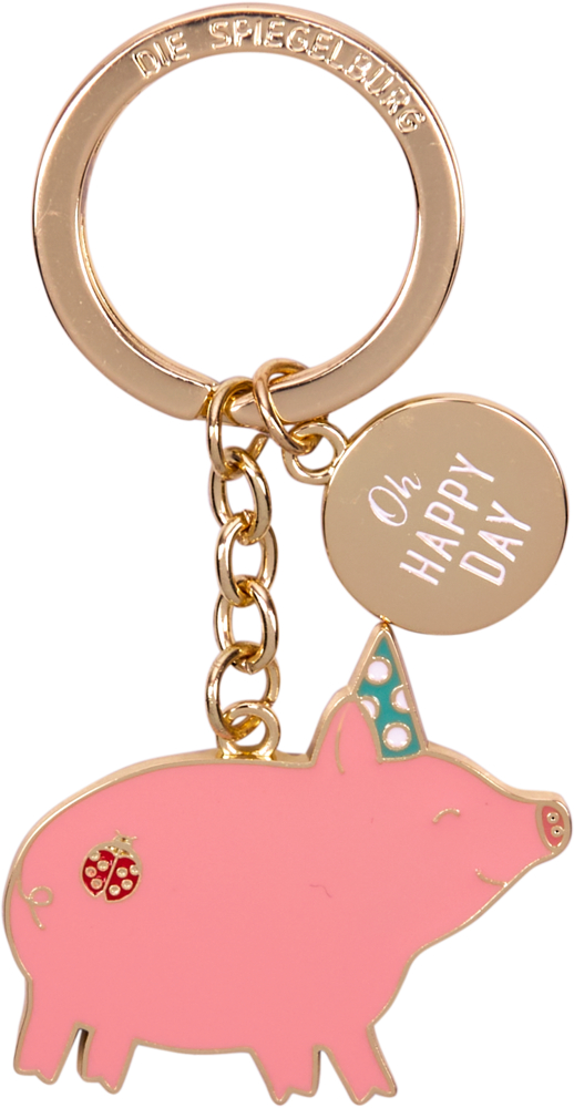 Schlüsselanhänger mit rosa Schwein, grünem Partyhut und kleinem Marienkäfer, dazu runder Anhänger mit Schrift „Oh Happy Day“ am Schlüsselring.
