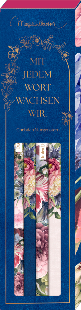 Blaue Verpackung mit goldener Aufschrift und drei Bleistiften mit floralen Mustern in Aussparung.
