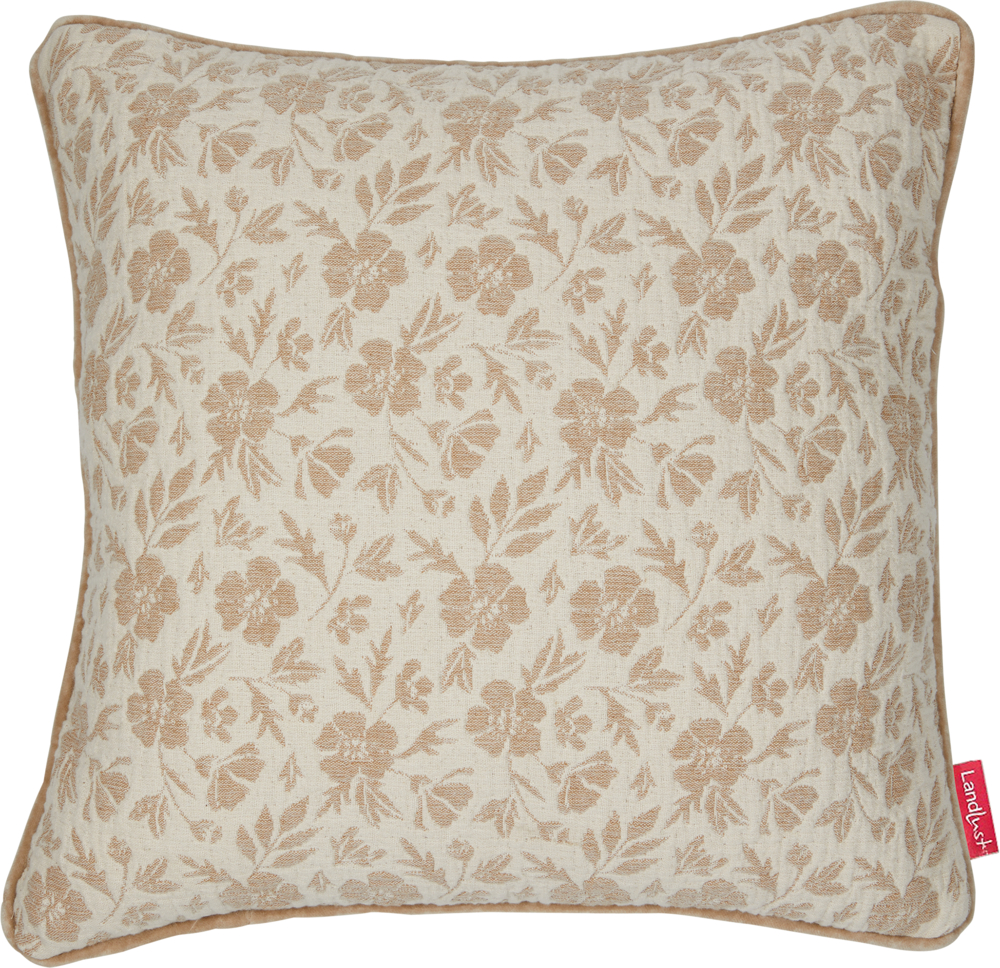Quadratisches beiges Kissen mit hellbraunem Blumenmuster und einem roten Stoffetikett an der Seite.