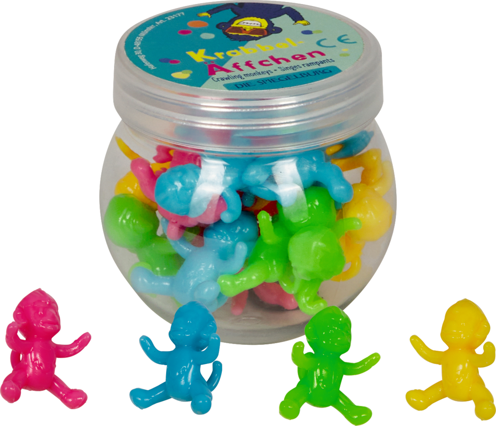 Ein Glas mit bunten Plastikäddchen, davor vier Affen in Pink, Blau, Grün und Gelb.