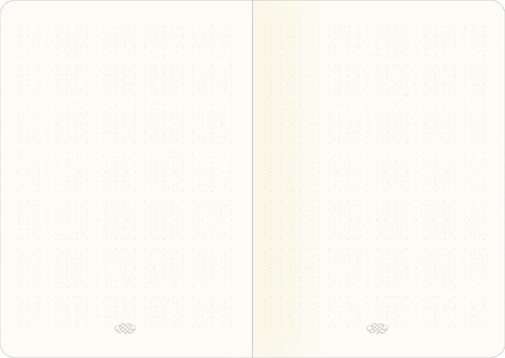 Offenes Notizbuch mit zwei leeren, gepunkteten Seiten, die unten jeweils ein kleines Muster aufweisen.