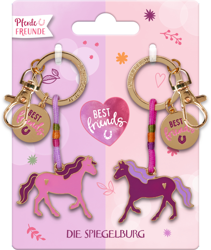 Zwei Pferde-Schlüsselanhänger mit einem rosafarbenen und einem lilafarbenen Pferdeanhänger auf einer rosa „Best Friends“-Karte von Die Spiegelburg.