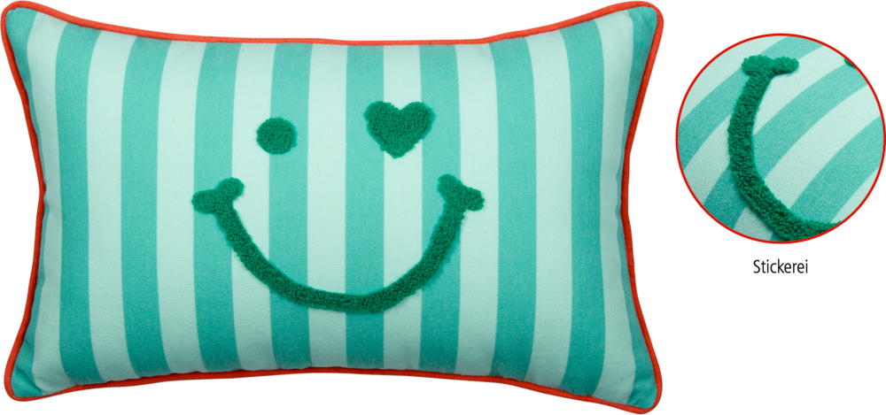 Rechteckiges Kissen mit türkis-helltürkisenen Streifen, roter Kante und grüner punch needle Stickerei in Happy Face Form mit Herz als Auge, dazu auch eine Nahansicht der Stickerei,.