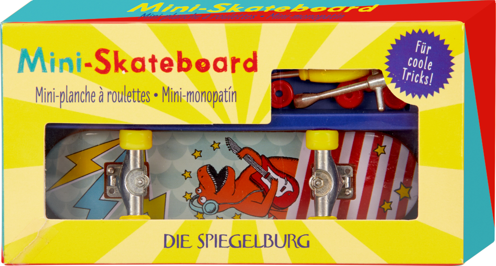 Mini-Skateboard-Spielzeug in einer bunten Schachtel mit einem roten Dinosaurier und deutsch-französischem Text.
