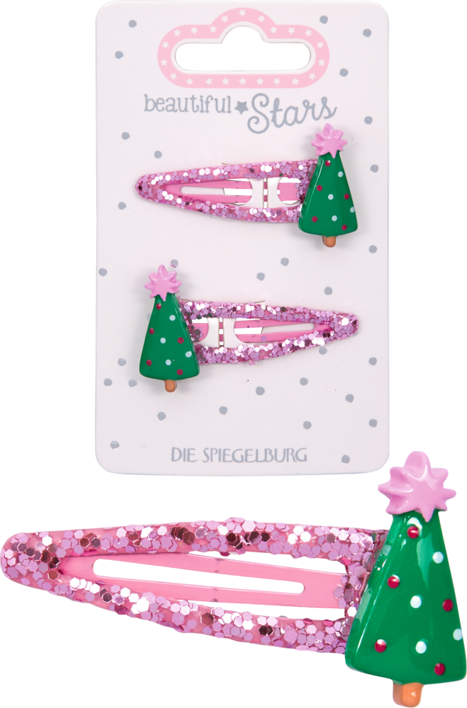 Eine rosa glitzernde Haarspange mit grünem Tannenbaum-Motiv und pinkem Sternaufsatz, dadrüber zwei Haarspangen auf der Produktverpackung.