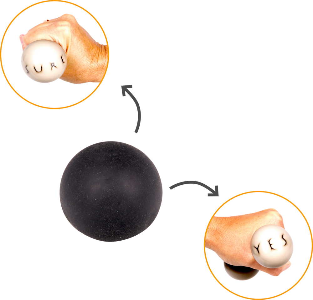 Eine Hand drückt einen schwarzen Ball. SURE und YES erscheinen auf einer versteckten weißen Fläche.