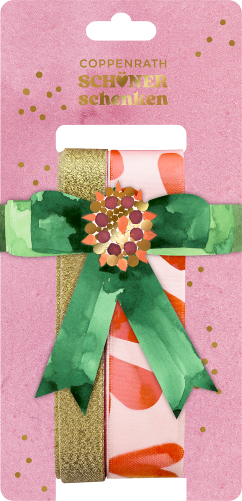 Zwei Geschenkbänder in Gold und Rosa mit grüner Schleife und gold-roter Blume auf rosa Kartonverpackung.
