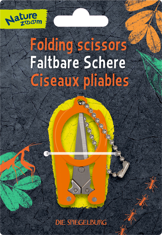 Orangefarbener Schlüsselanhänger mit klappbarer Schere auf einer Nature Zoom-Verpackung mit Tier- und Blattmotiven.